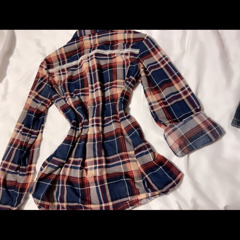 Long sleeve blouse. Size small. Blue rain brand